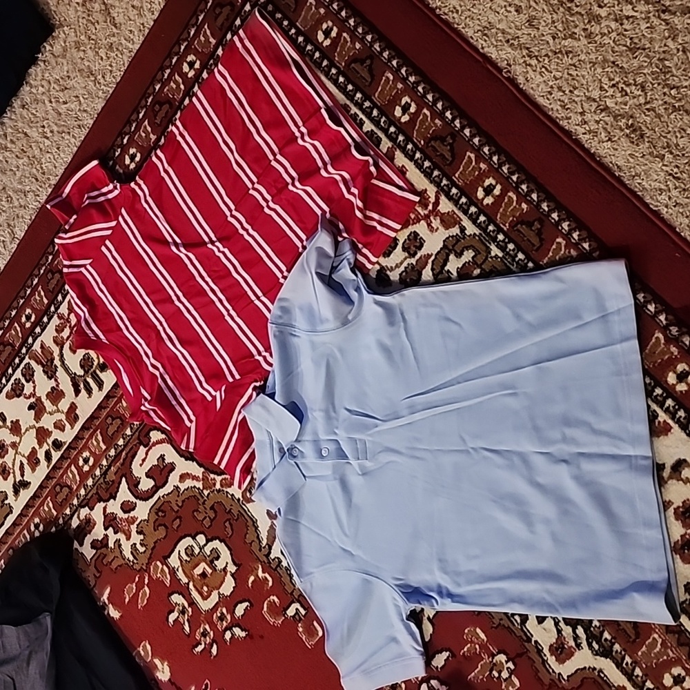 2 Medium size shirts for boys. $ 12 for both